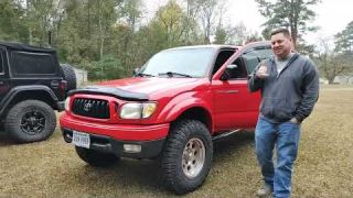 Cory's 2001 Toyota Tacoma w/ 3 inch lift, 33 inch tires, & rock sliders offroads the Proving Grounds